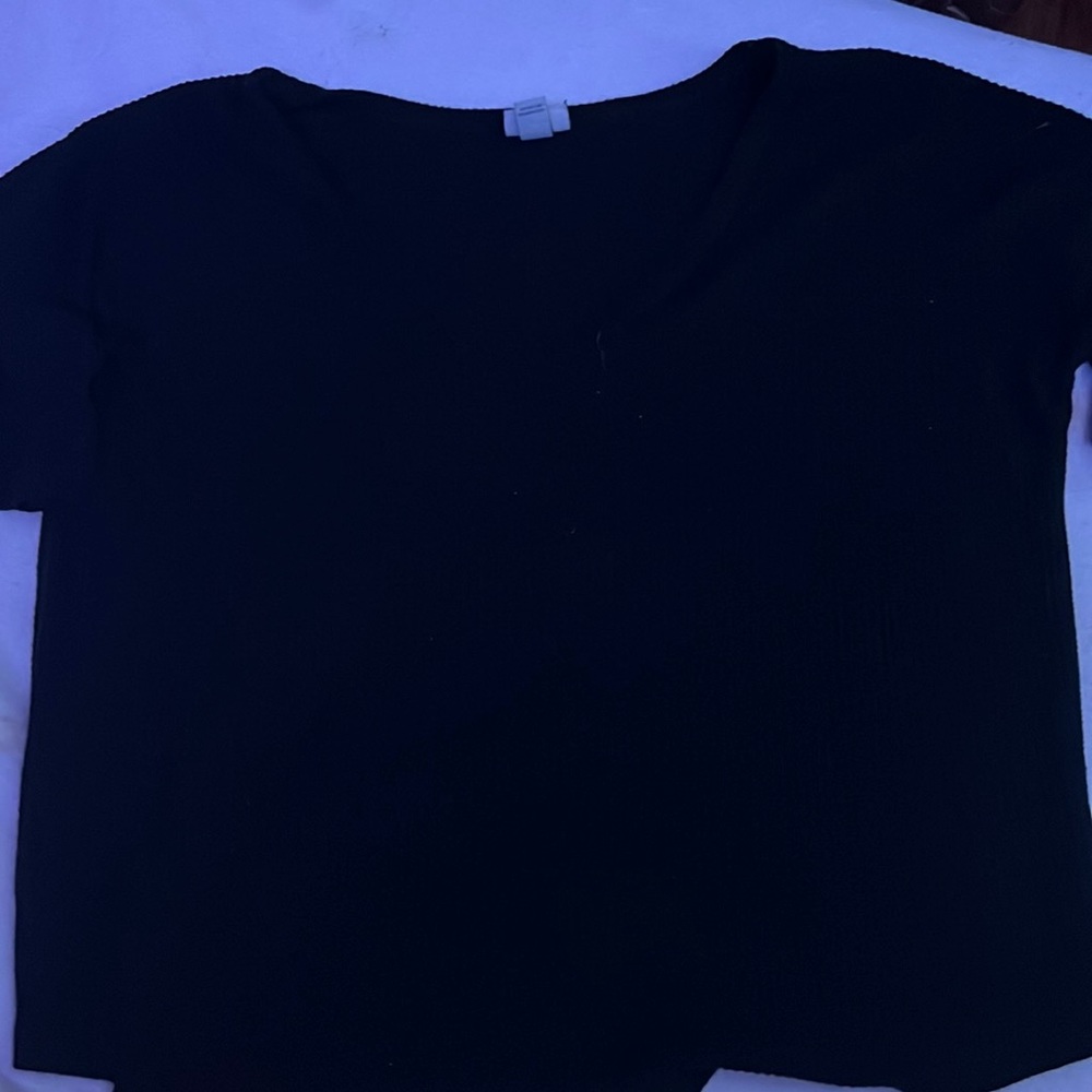 This is a compfy top from target. 71% Rayon, 21% Polyester, and 4% Spandex.